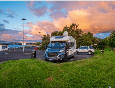 Motorhome parked at sunset